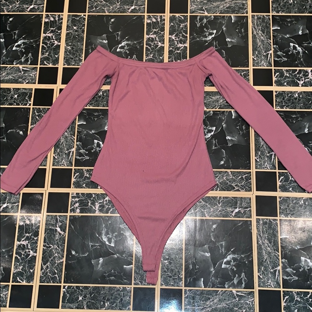 Pink body suit